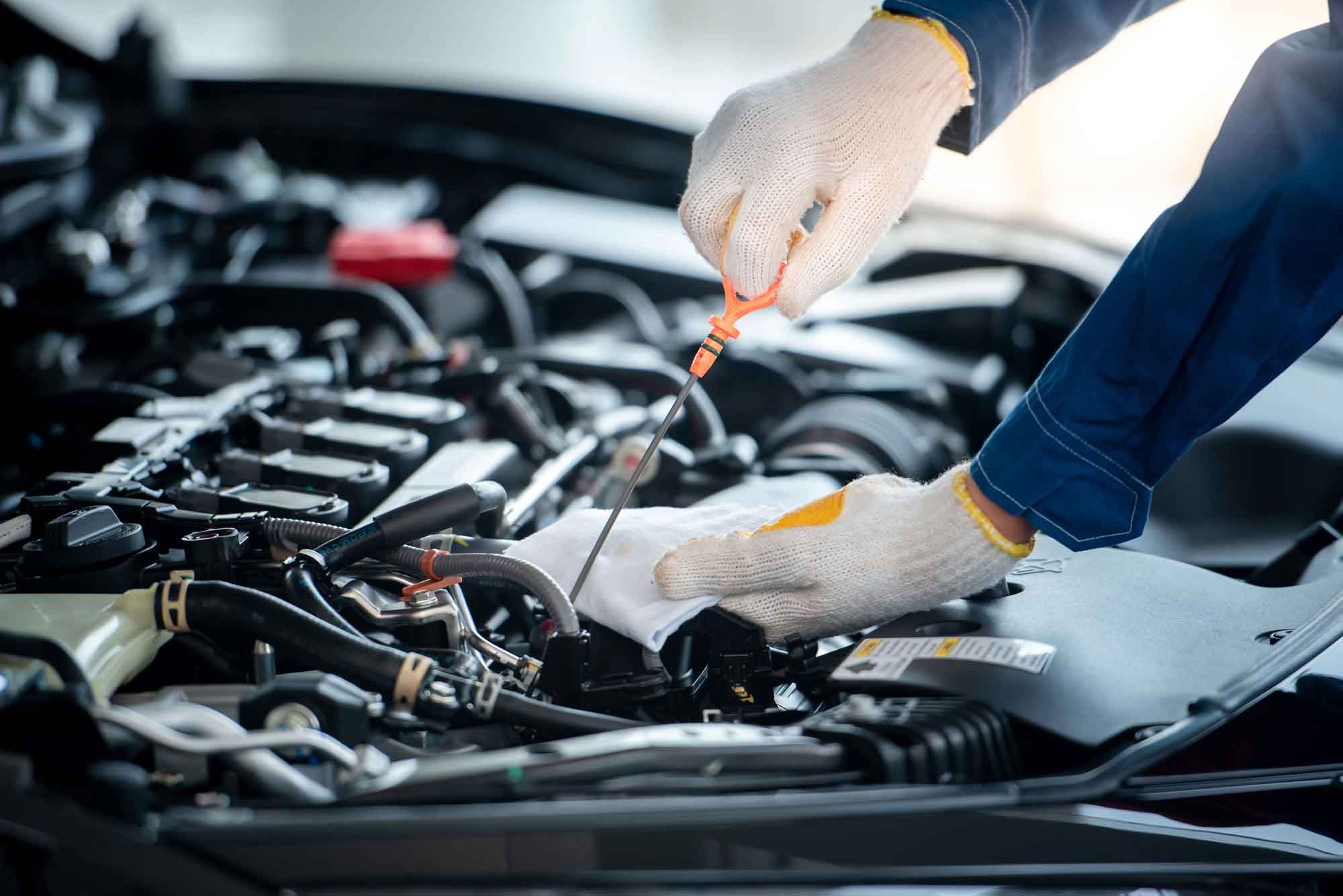 Mechanic Repairing Car Engine Mechanic Repairing Car Engine